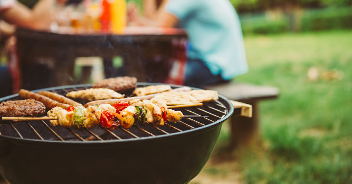 Friends making barbecue.