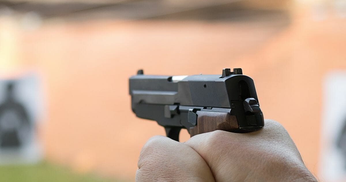 A gun at a shooting range.