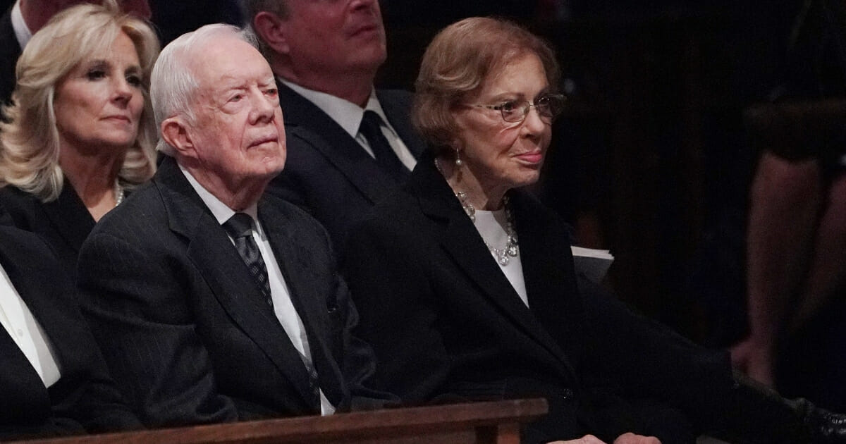Former President Jimmy Carter and former first lady Rosalynn Carter attend the funeral service for former President George H. W. Bush at the National Cathedral in Washington, D.C., on Dec. 5, 2018.