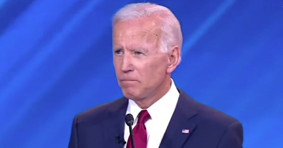 Progressive activists silenced a sad-faced Joe Biden on Thursday night as they erupted in protests while the former vice president prepared to answer the final question at the Democratic presidential debate.