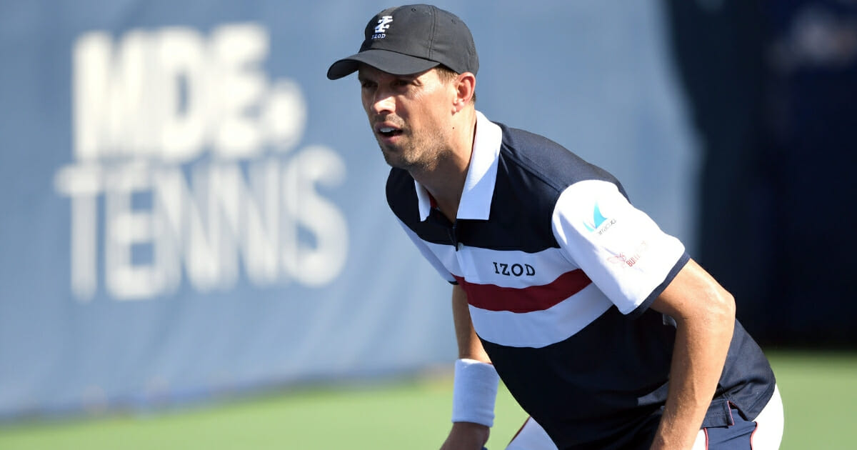 Mike Bryan, playing with his brother, Bob, prepares for a shot during the Citi Open.