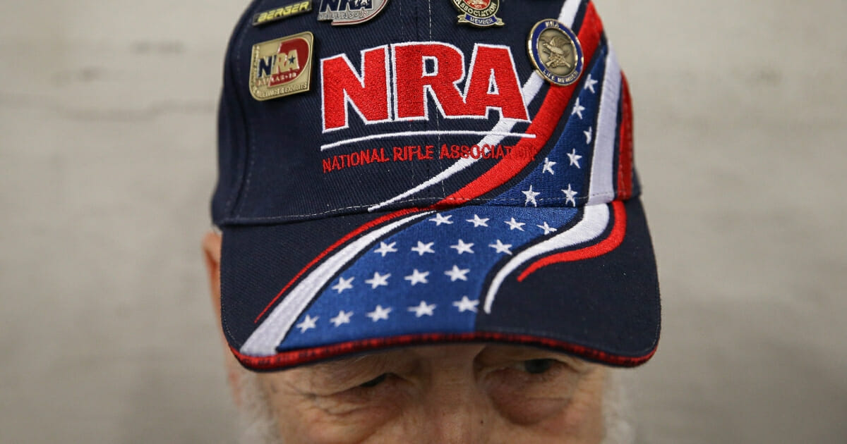 Gaylen Searles of Alaska wears an NRA hat during the organization's 2018 convention in Dallas.