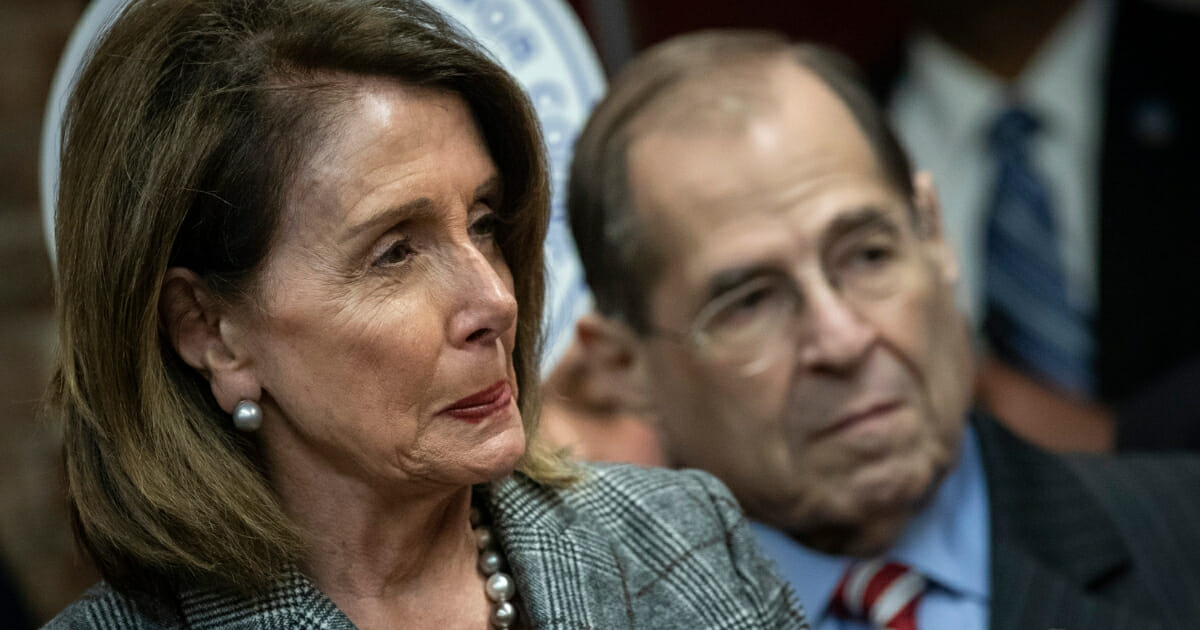 Democratic House Speaker Nancy Pelosi of California and Judiciary Committee Chairman Jerrold Nadler of New York look on during a news conference March 20, 2019, in New York City.