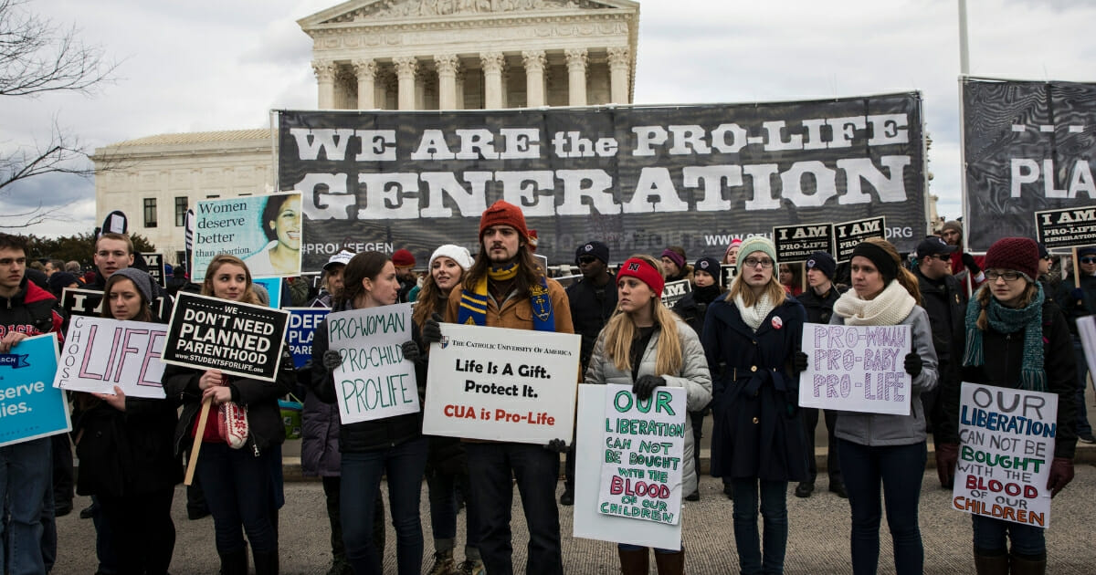 Pro-life demonstrators protest in front of the Supreme Court during the 44th annual March for Life in Washington, D.C., on Jan. 27, 2017.