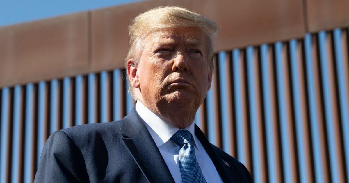 President Donald Trump visits the US-Mexico border fence in Otay Mesa, California on Sept. 18, 2019.