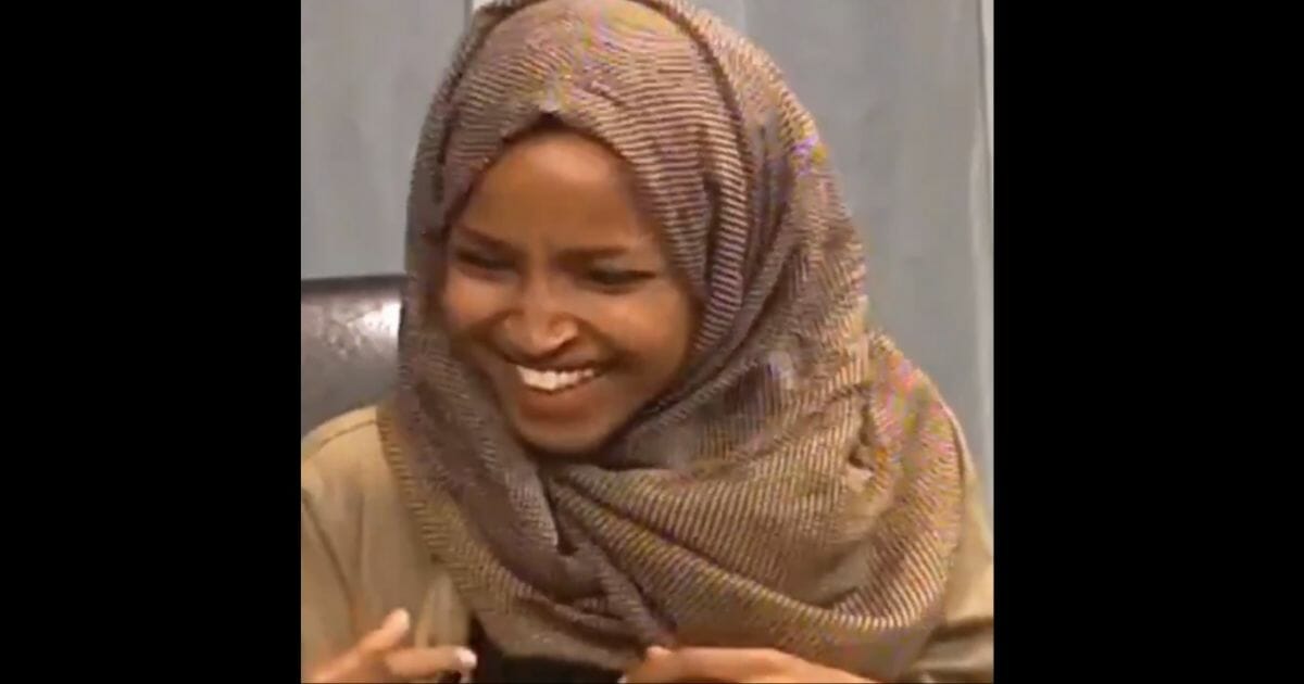 Minnesota Rep. Ilhan Omar laughs as she references the terrorist organization Hezbollah.