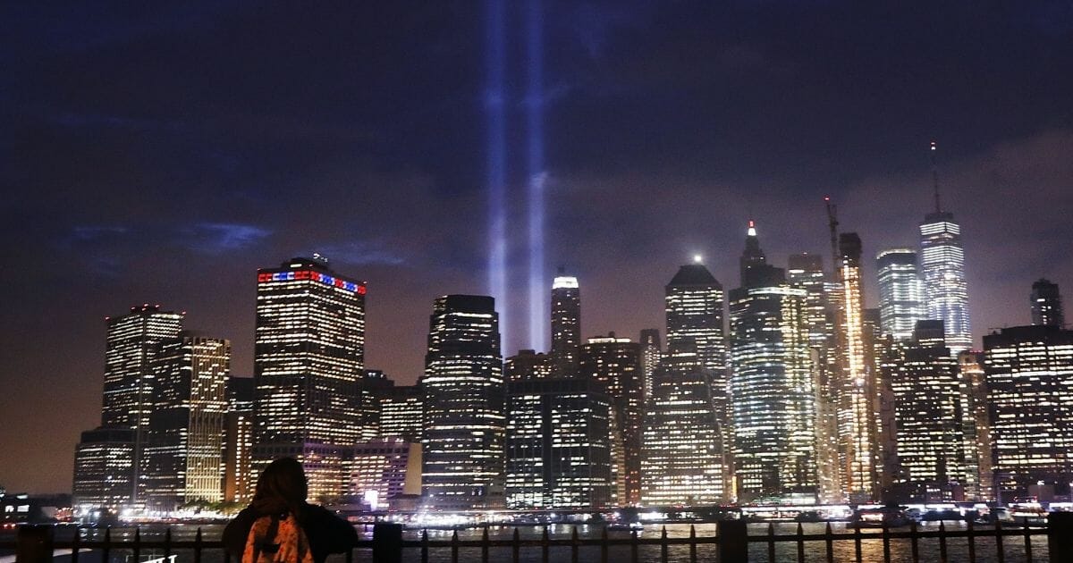 The 9/11 memorial lights up the New York sky.