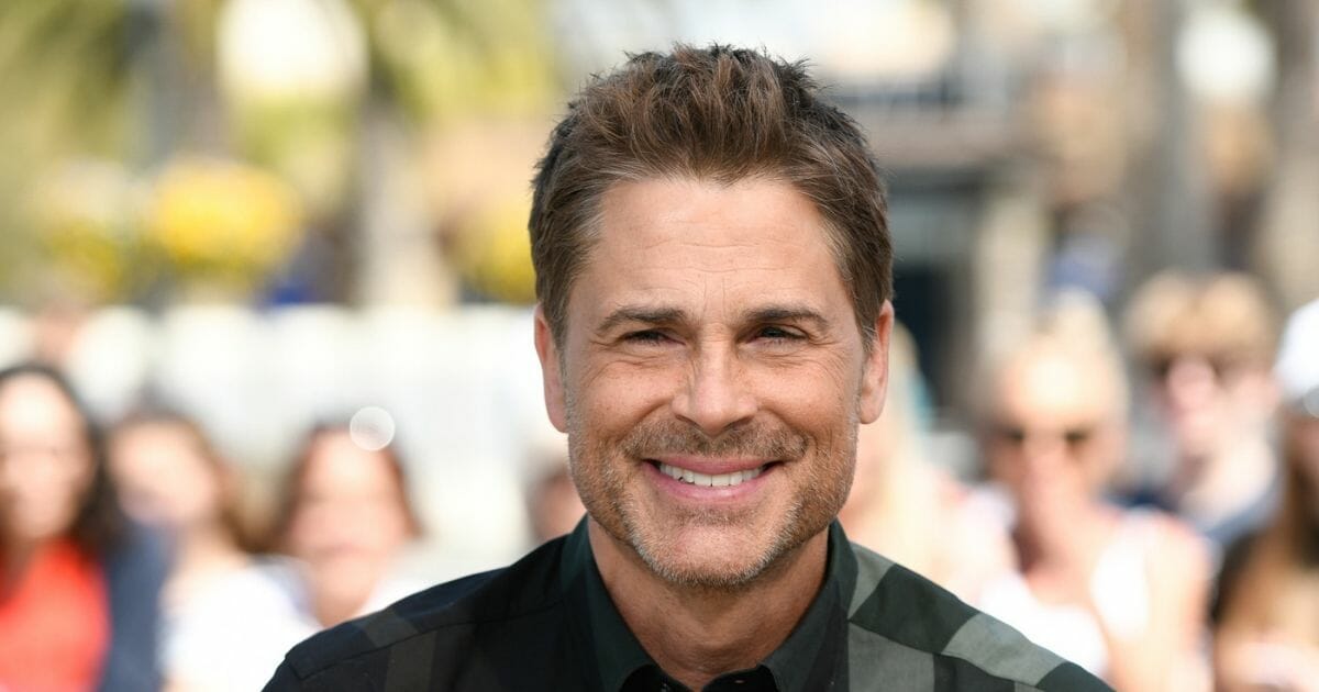 Actor Rob Lowe visits "Extra" at Universal Studios Hollywood on March 26, 2019 in Universal City, California.