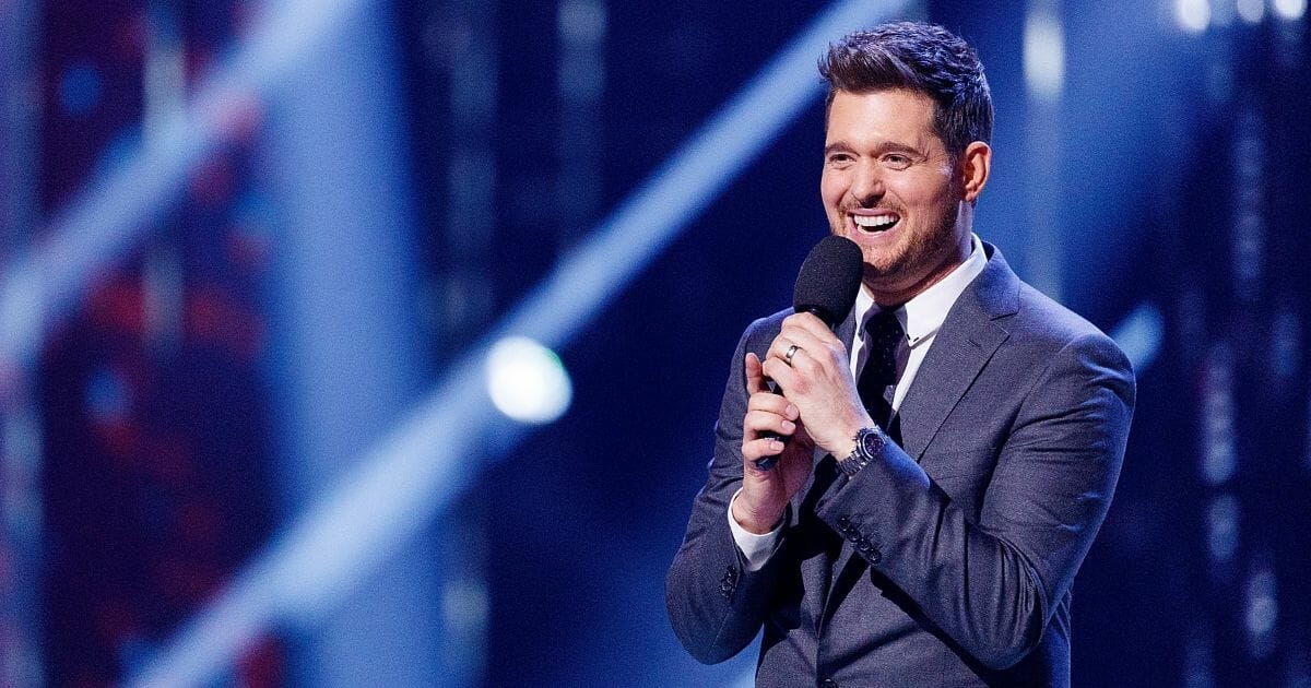 Singer Michael Buble speaks on stage during the 2018 JUNO Awards at Rogers Arena on March 25, 2018 in Vancouver, Canada.