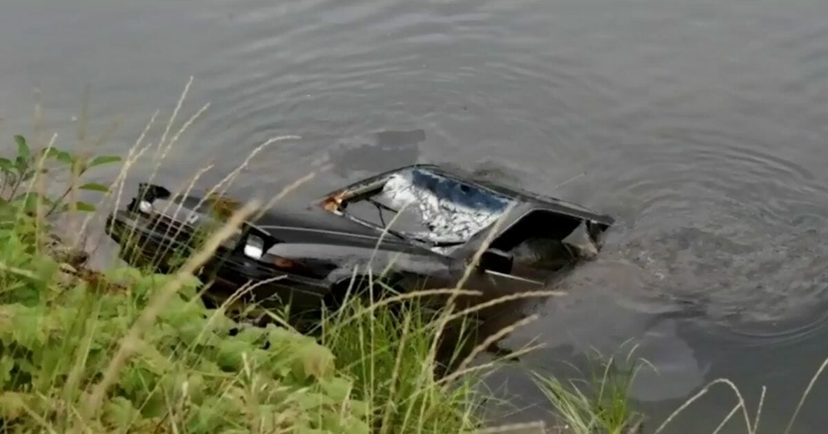 A photo of the car that a 13-year-old boy discovered at the bottom of a lake in August in British Columbia.