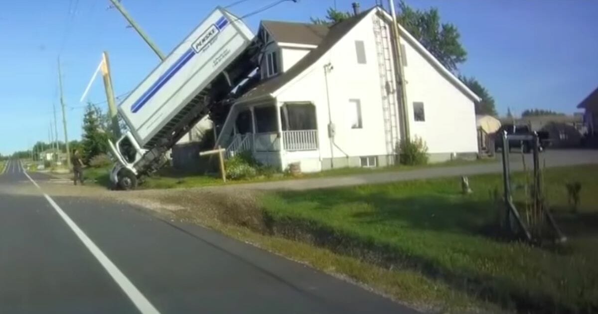 Denis Lefebvre was driving in Alban, Ontario, Canada, on Monday when his dashcam captured a moving truck veer off the road and end up on top of a house.