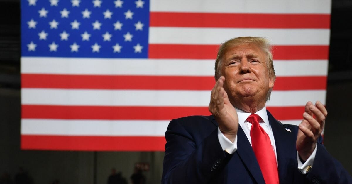 President Donald Trump speaks during a "Keep America Great" campaign rally at the SNHU Arena in Manchester, New Hampshire, on Aug. 15, 2019.