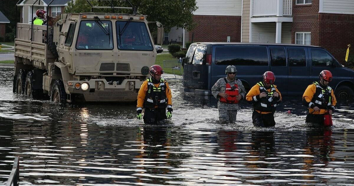 Hurricane Florence recovery workers are seen Sept. 18, 2018, in Fayetteville, North Carolina.