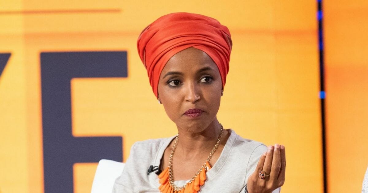 Rep. Ilhan Omar makes an appearance at a BET event at Howard University in Washington on Sept. 10. The congresswoman's murky past is getting new attention after she deleted a 6-year-old Father's Day tweet on Tuesday.