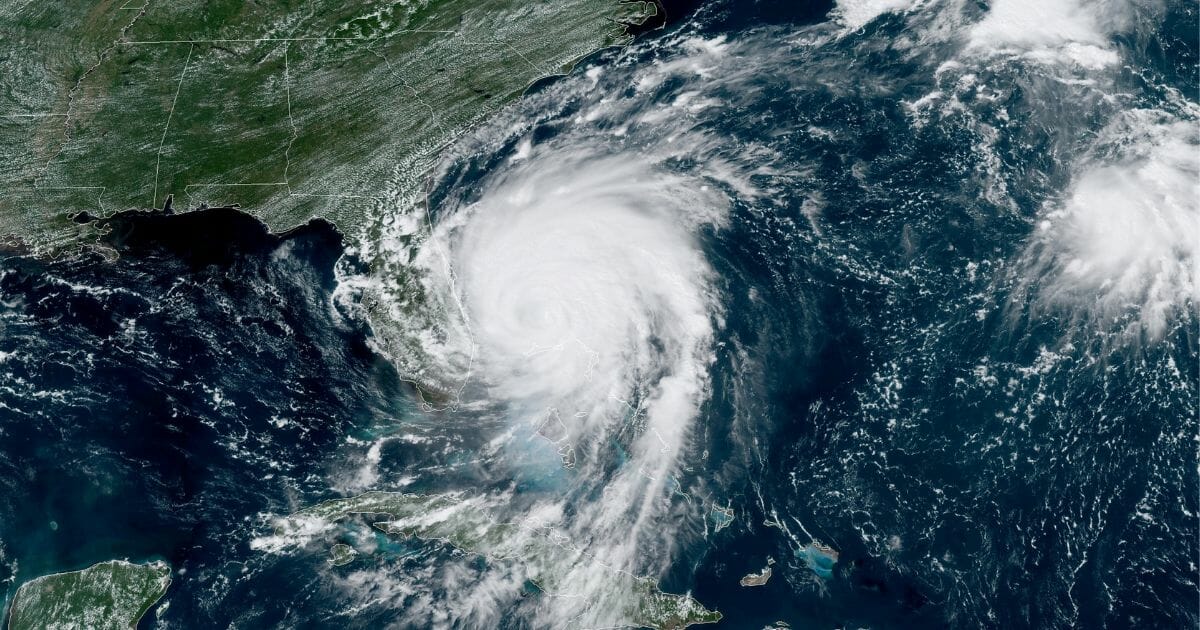 In this NOAA GOES-East satellite handout image, Hurricane Dorian, now a Cat. 2 storm, inches northwest away from the Bahamas on September 3, 2019 in the Atlantic Ocean.