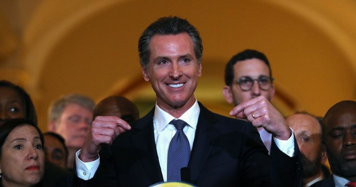 Gov. Newsom pictured during a news conference.