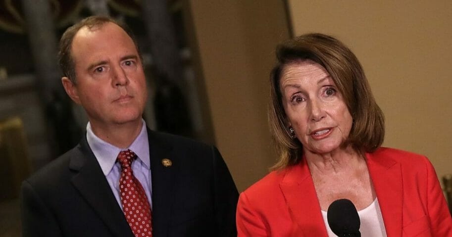 House Minority Leader Nancy Pelosi speaks at a news conference with Rep. Adam Schiff.