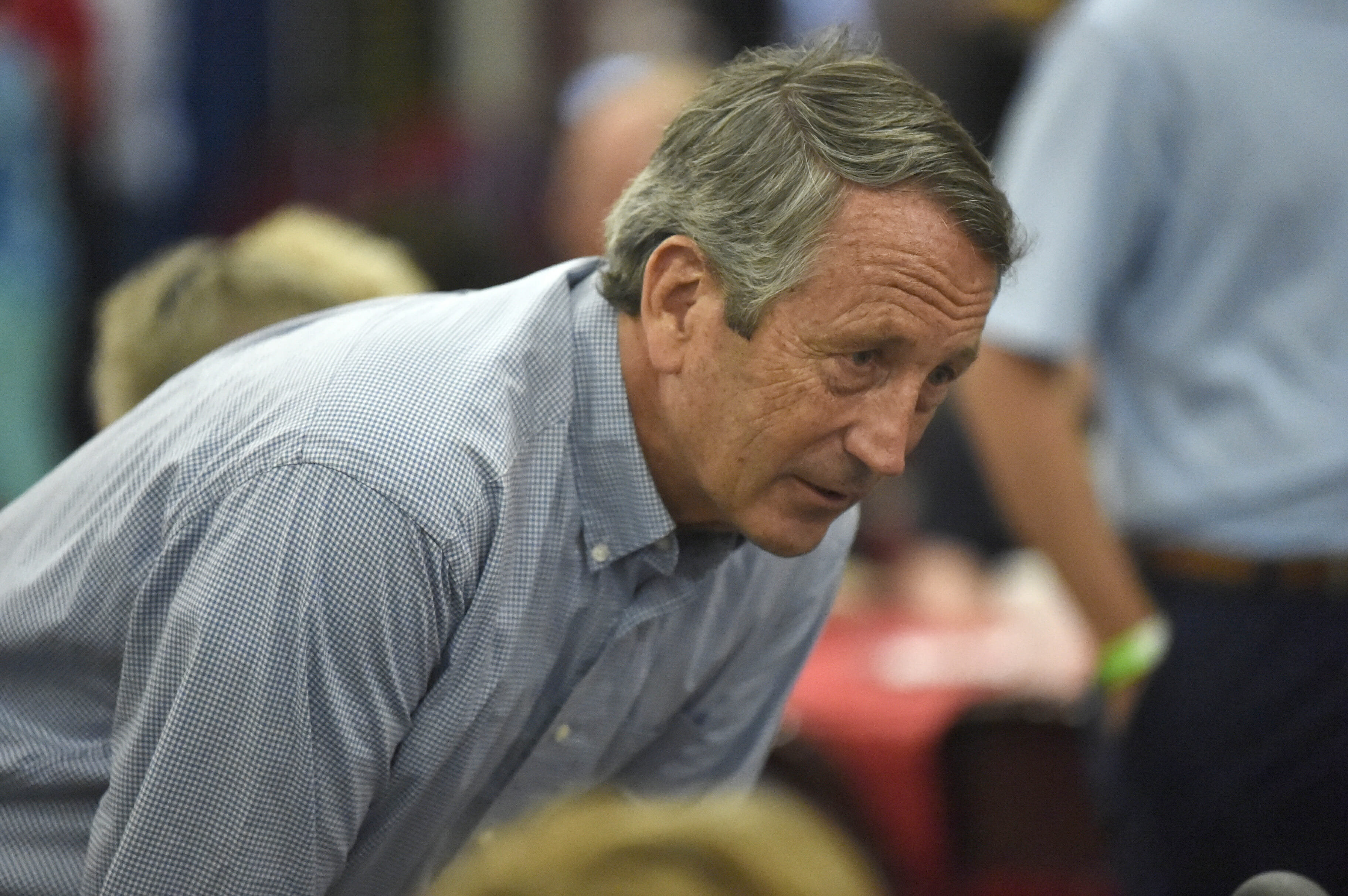 In this Aug. 26, 2019, file photo, former Rep. Mark Sanford speaks with attendees at Rep. Jeff Duncan's annual fundraiser in Anderson, S.C.