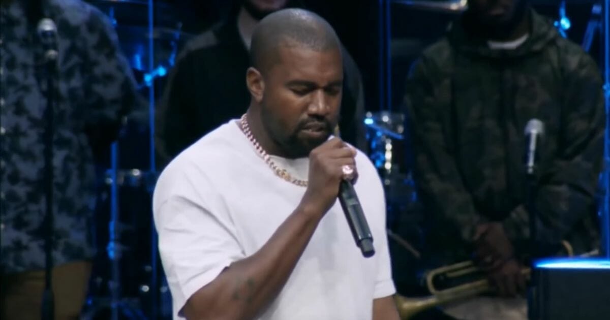 Kanye West preaches at Sunday service in Atlanta.