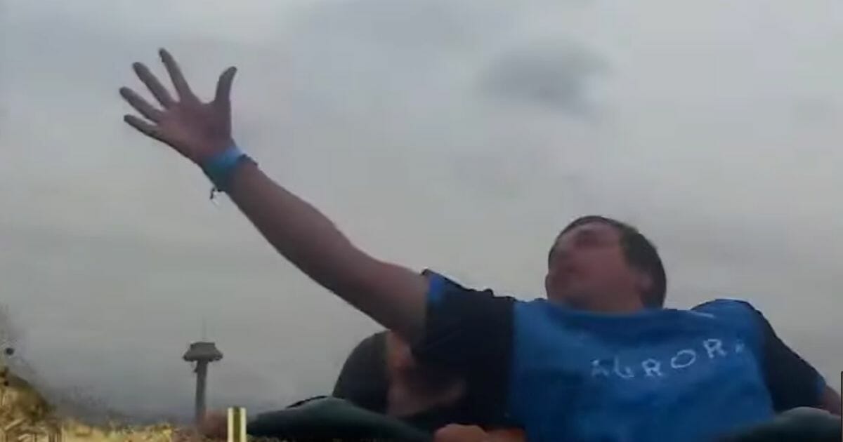 New Zealand fistball player catches someone's cellphone.