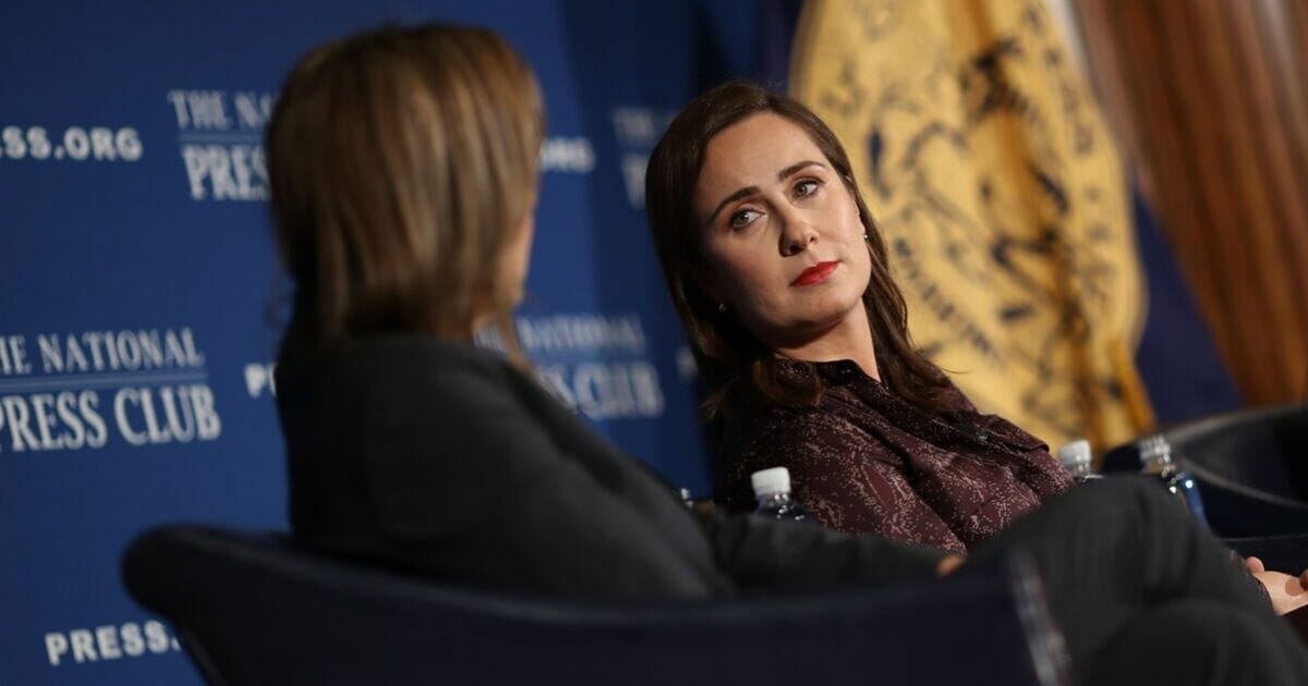 Robin Pogrebin (L) and Kate Kelly (C), authors of the book “The Education of Brett Kavanaugh”, answer questions about the on book Sept. 18, 2019 in Washington, D.C.