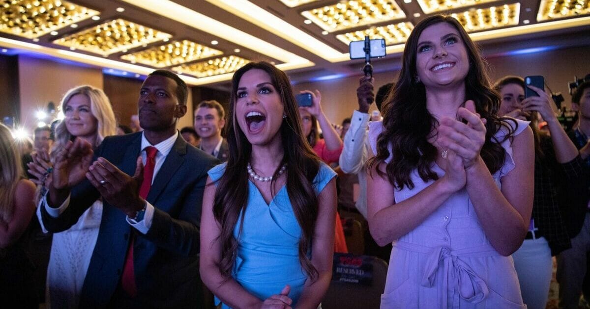 Supporters of US President Donald Trump cheer as he appears on stage before addressing the Turning Point USAs Teen Student Action Summit in Washington, DC, on July 23, 2019.