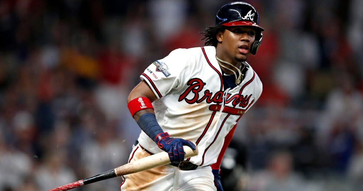 Ronald Acuna Jr. of the Atlanta Braves watches his hit for a single against the St. Louis Cardinals in Game 1 of the National League Division Series at SunTrust Park.