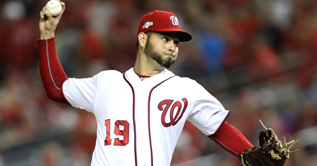 Anibal Sanchez #19 of the Washington Nationals delivers in the first inning of Game 3 of the NLDS against the Los Angeles Dodgers at Nationals Park on Oct. 6, 2019 in Washington, D.C.