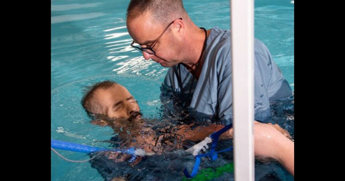 One dying man's wish was to be baptized, but he was on oxygen, so a team worked together to grant his final request.
