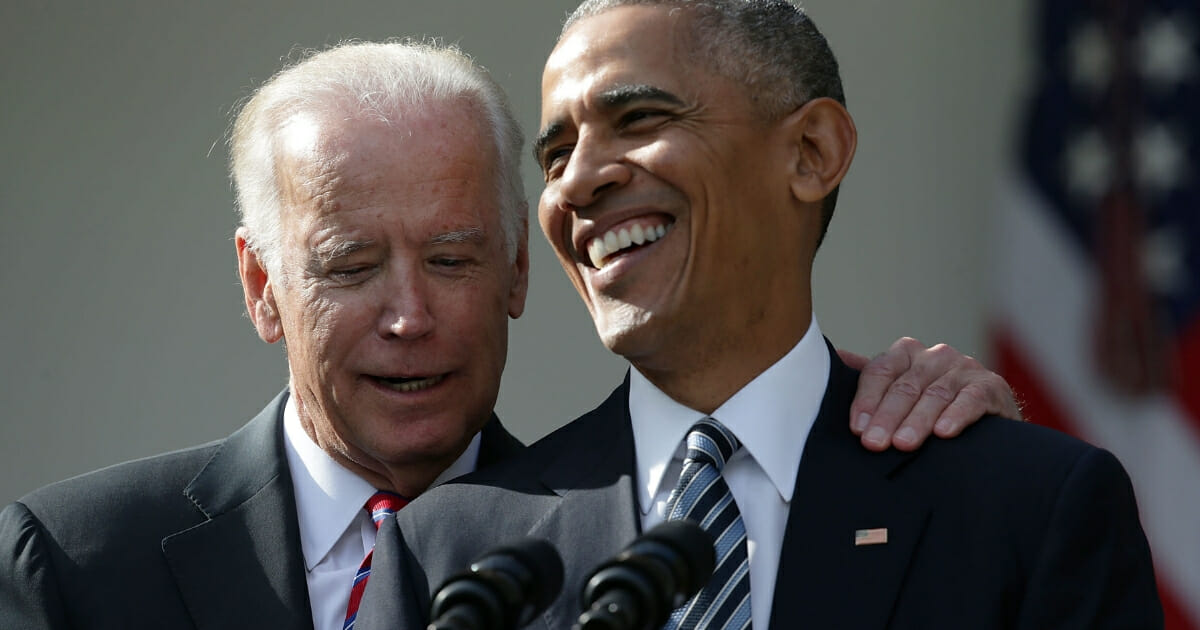 Then-President Barack Obama, right, and then-Vice President Joseph Biden share a moment during a statement on the election results at the Rose Garden of the White House on Nov. 9, 2016, in Washington, D.C.