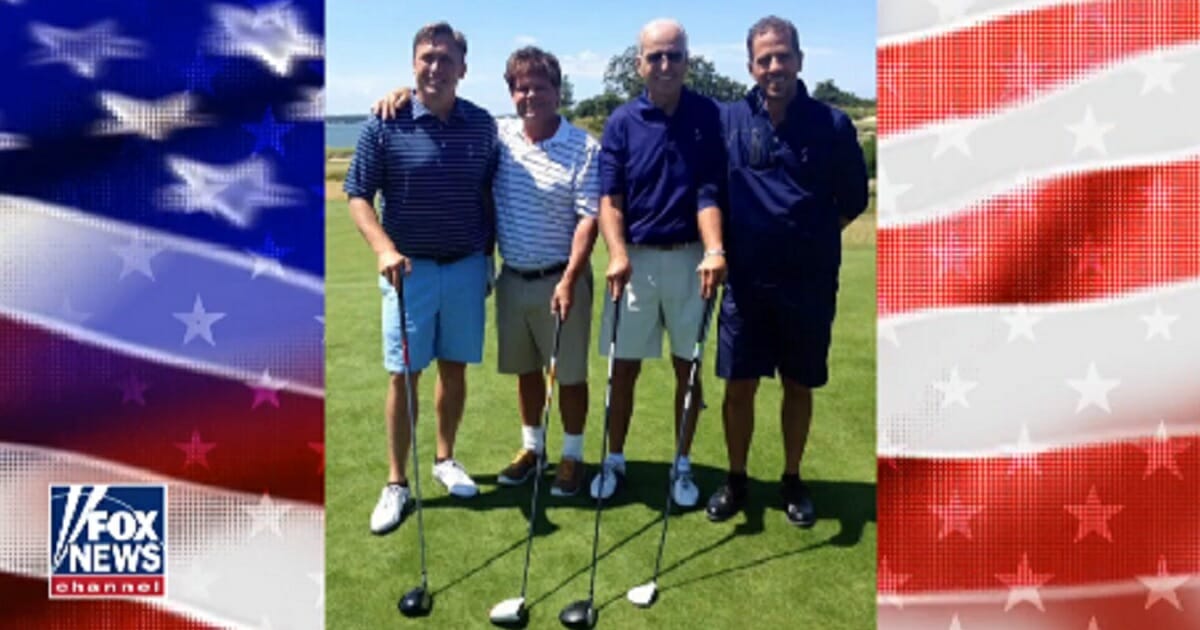 In a picture broadcast by Tucker Carlson on Monday, former Vice President Joe biden is shown on a golf course with his son, Hunter, his son's business partner and a fourth unidentified man.