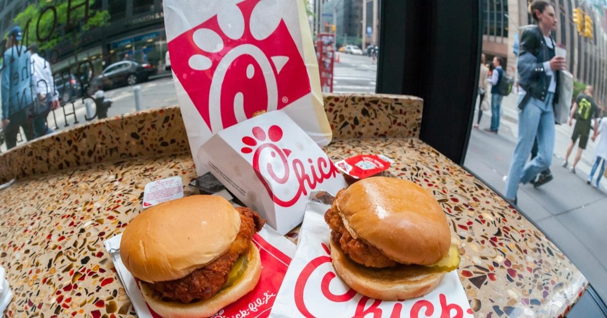 A classic Chick-fil-A chicken sandwich and a Spicy Chicken sandwich in a Chick-fil-A restaurant in New York.