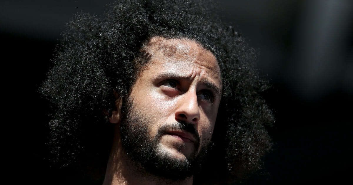 Former San Francisco 49er Colin Kaepernick watches a match on day four of the 2019 US Open at the USTA Billie Jean King National Tennis Center on Aug. 29, 2019, in the Queens borough of New York City.