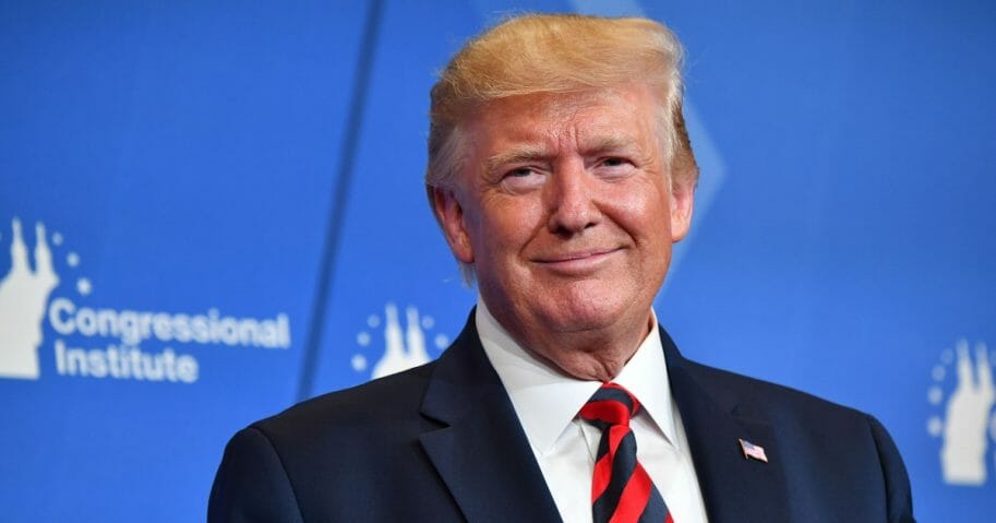 President Donald Trump smiles as he delivers remarks during the 2019 House Republican Conference Member Retreat Dinner in Baltimore, Maryland, on Sept. 12, 2019.