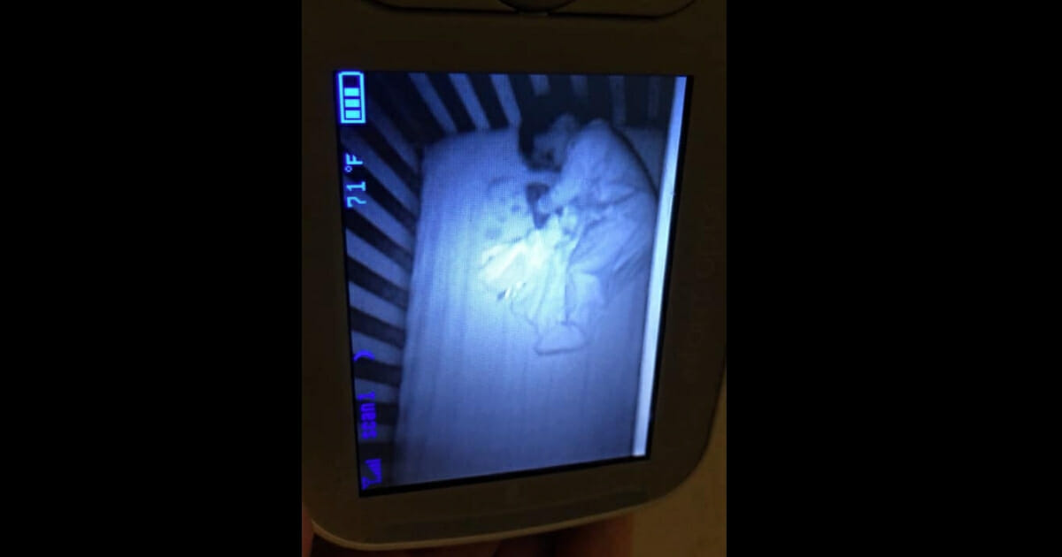 A worried mother nearly jumped out of her skin on Thursday night when she discovered what appeared to be the face of a "ghost" baby next to her sleeping son.