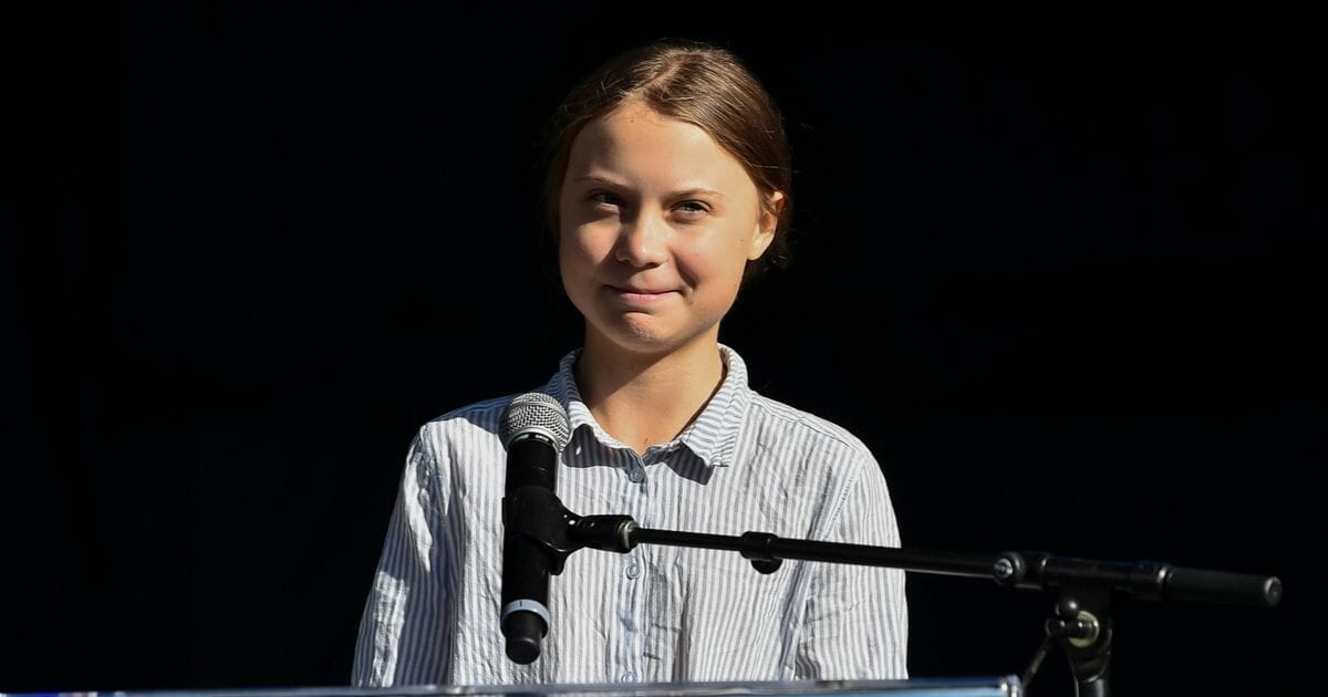 Swedish climate activist Greta Thunberg takes to the podium to address young activists and their supporters during the rally for action on climate change on Sept. 27, 2019, in Montreal, Canada.