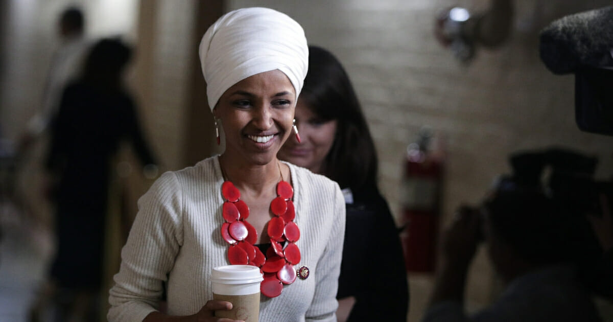 Democratic Minnesota Rep. Ilhan Omar arrives at a House Democratic Caucus meeting at the U.S. Capitol on Sept. 25, 2019, in Washington, D.C.