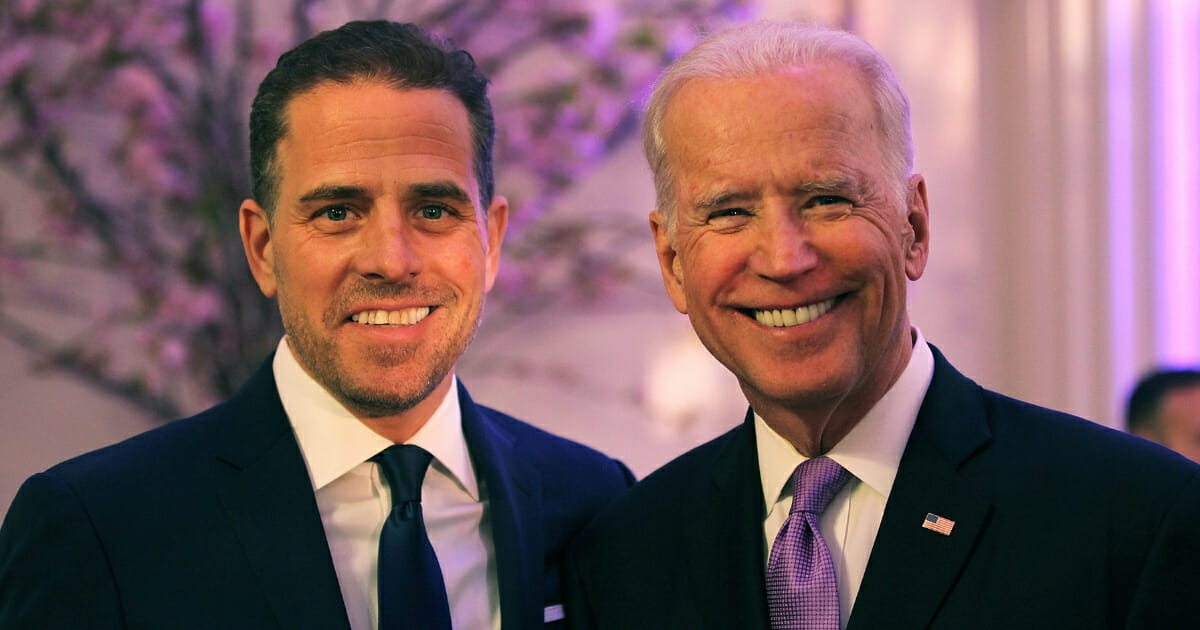 Then-Vice President Joe Biden, right, and his son, Hunter, attend the World Food Program USA's Annual McGovern-Dole Leadership Award Ceremony at Organization of American States on April 12, 2016, in Washington, D.C.