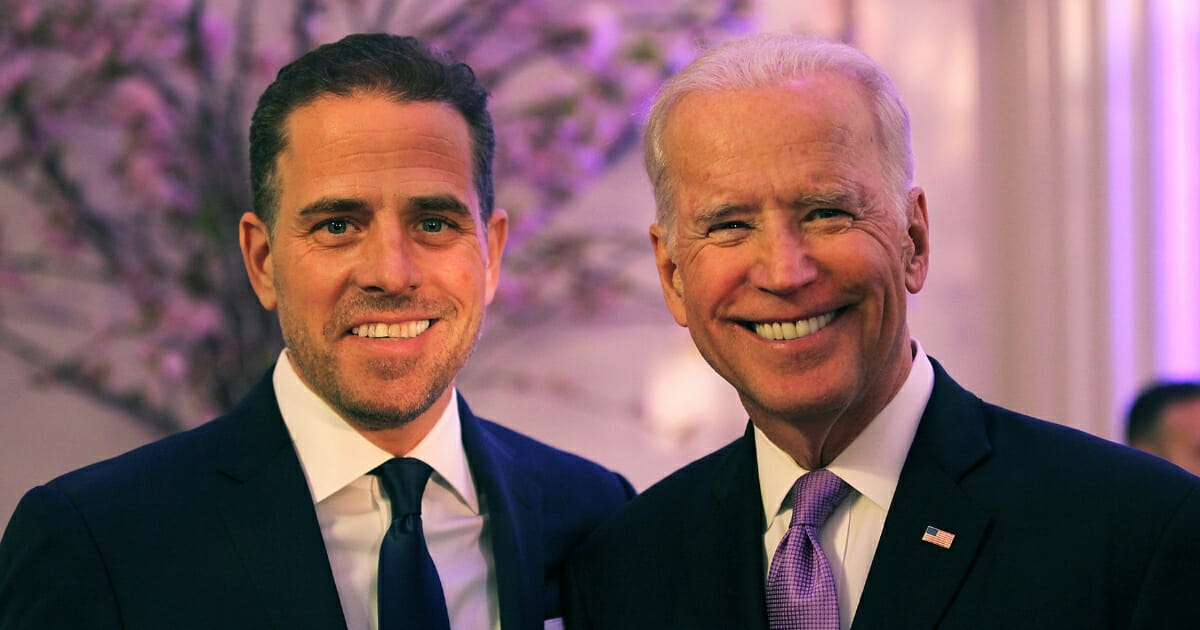 Then-Vice President Joe Biden and his son, Hunter, attend the World Food Program USA's Annual McGovern-Dole Leadership Award Ceremony at the Organization of American States on April 12, 2016, in Washington, D.C.