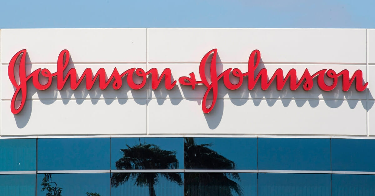 A sign on a building at the Johnson & Johnson campus shows its logo in Irvine, California, on Aug. 28, 2019.