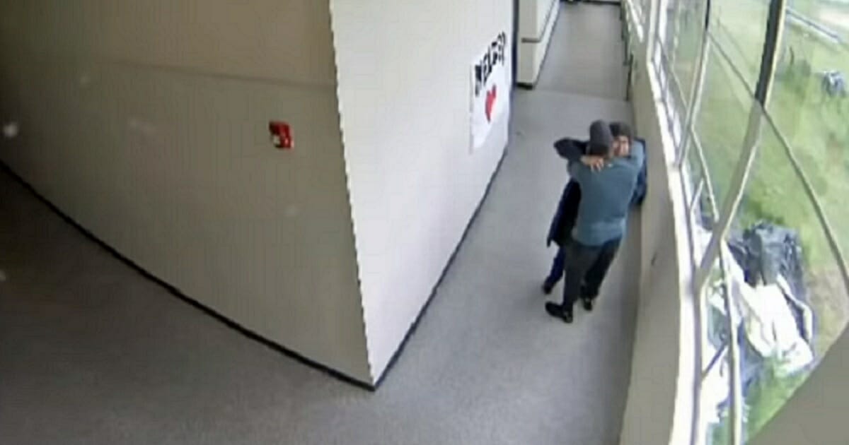 Coach Quickly Disarms Student with Shotgun Then Embraces Him in Video