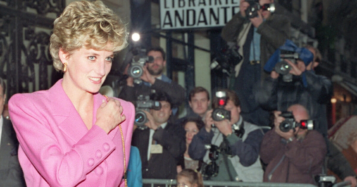 In this photo dated Nov. 14, 1992, Princess Diana is seen leaving the first anti-AIDS bookshop in Paris.