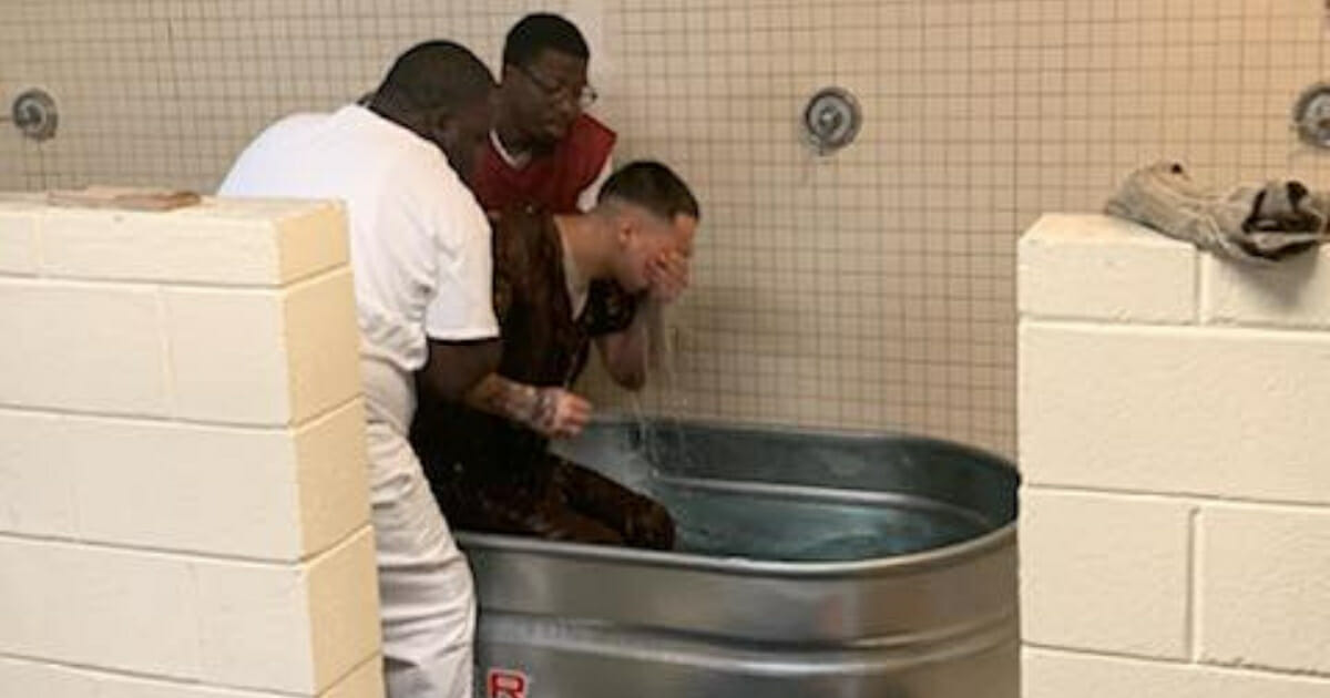 An inmate is baptized at the W. Glenn Campbell Detention Center in South Carolina.