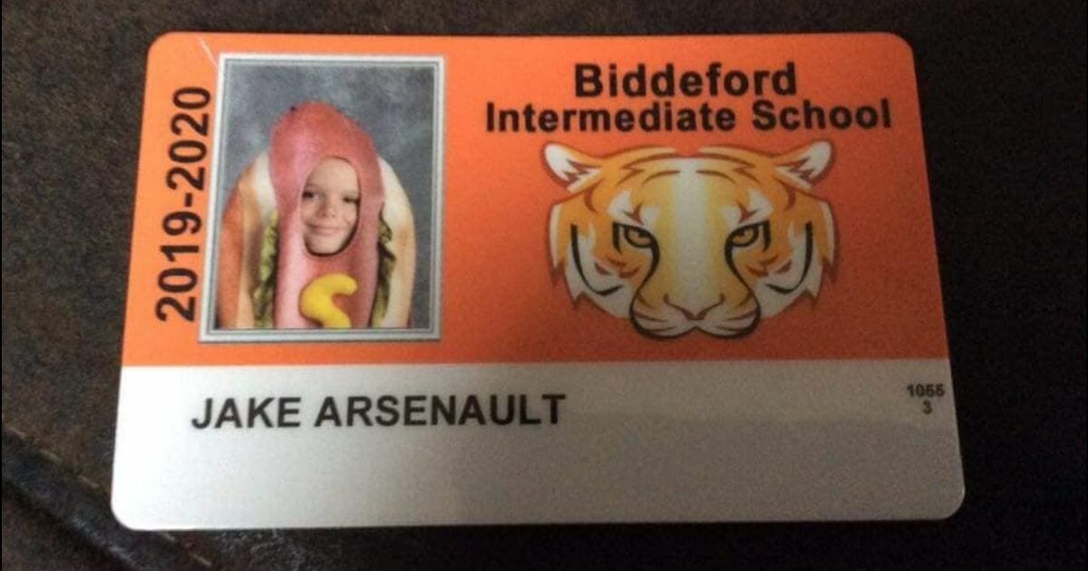 This kid took up his parents' dare to wear a hot dog costume for his school's photo day.