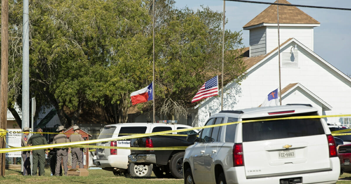 Law enforcement officials gather near the First Baptist Church in Sutherland Springs, Texas, following a shooting on Nov. 5, 2017, in which 26 people were killed.