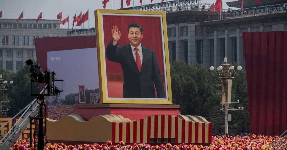 A giant portrait of Chinese President Xi Jinping is carried atop a float at a parade to celebrate the 70th anniversary of the founding of the People's Republic of China at Tiananmen Square on Oct. 1, 2019, in Beijing, China.