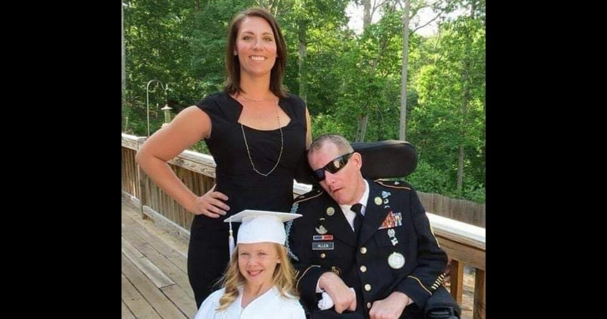 Retired Army Master Sgt. Mark Allen with his wife and daughter.