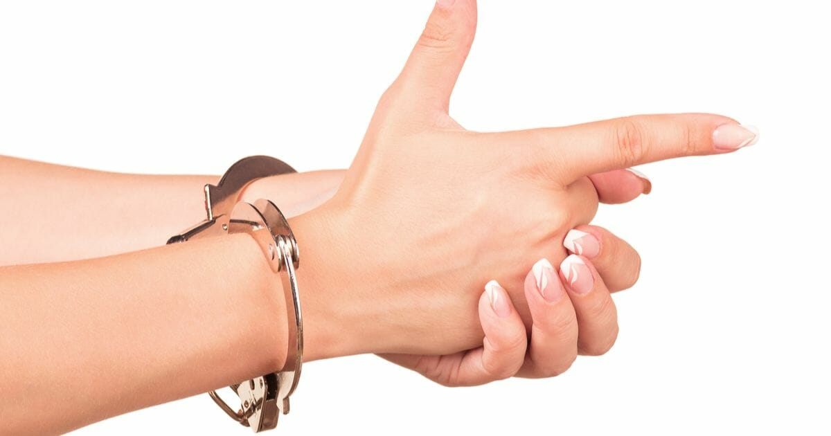 Fingers pointed like a gun.