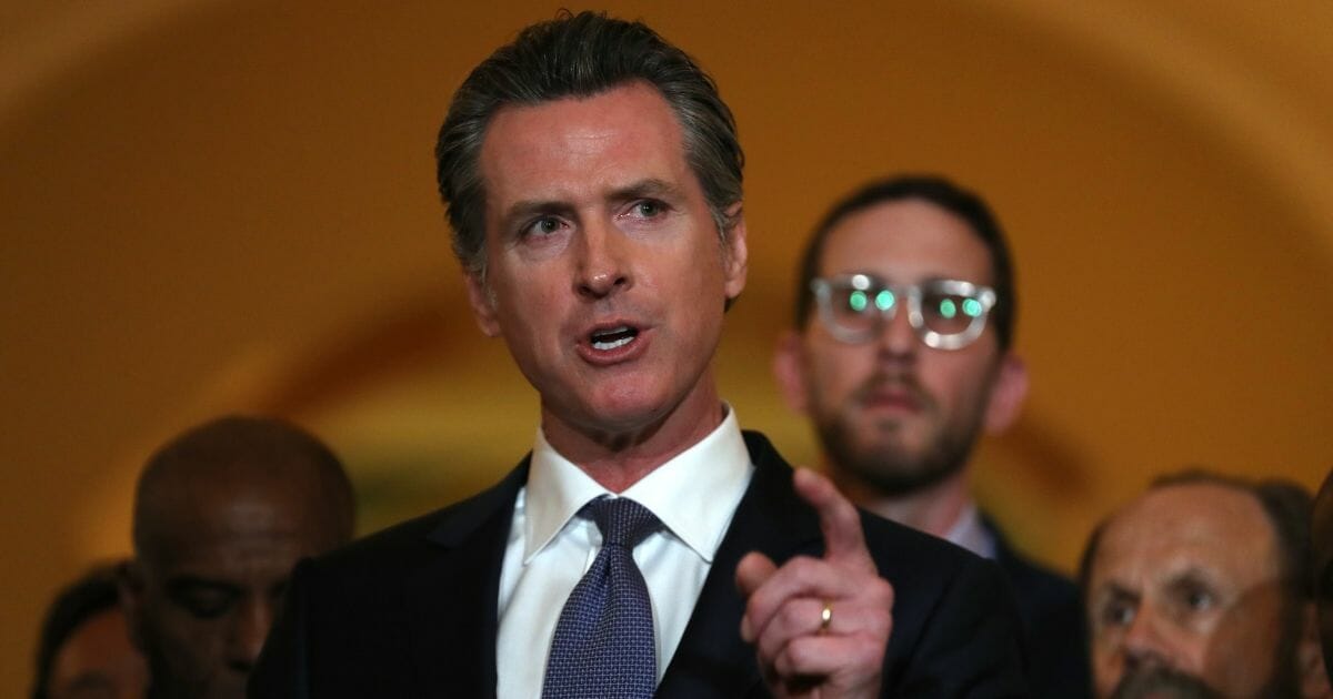California Gov. Gavin Newsom speaks during a news conference at the California Capitol on March 13 in Sacramento.