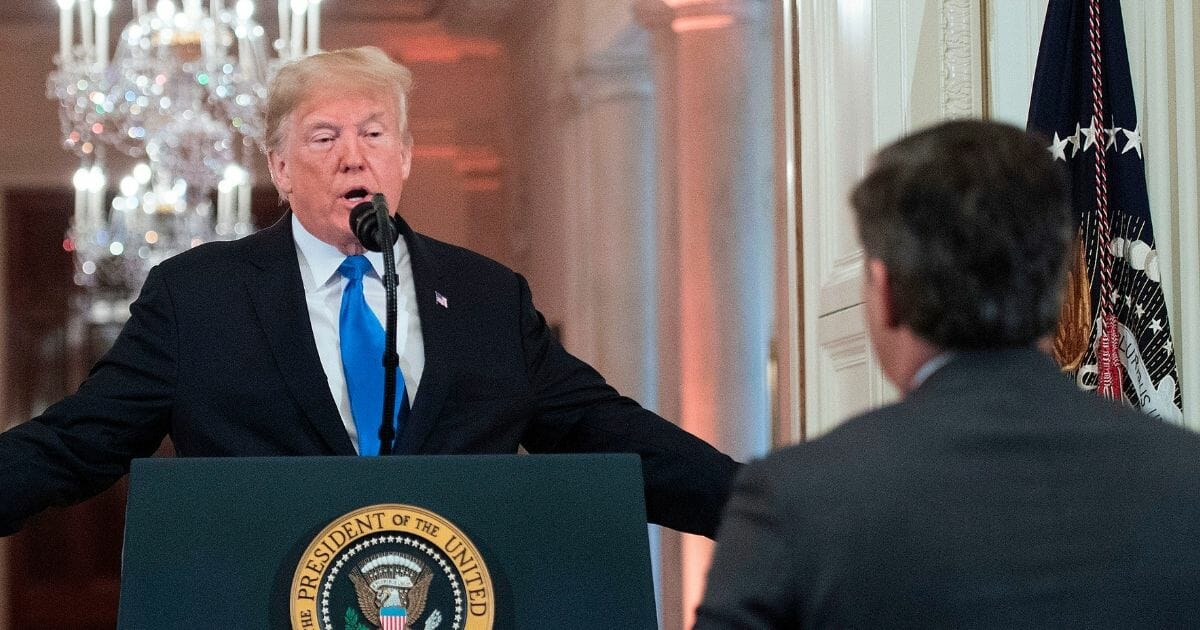 President Donald Trump responds during an exchange with CNN chief White House correspondent Jim Acosta during a post-midterm election news conference at the White House on Nov. 7, 2018.